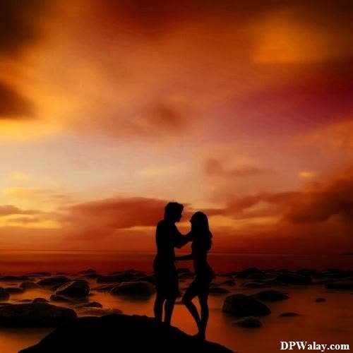 a couple kissing on the beach at sunset best couple dp for whatsapp 