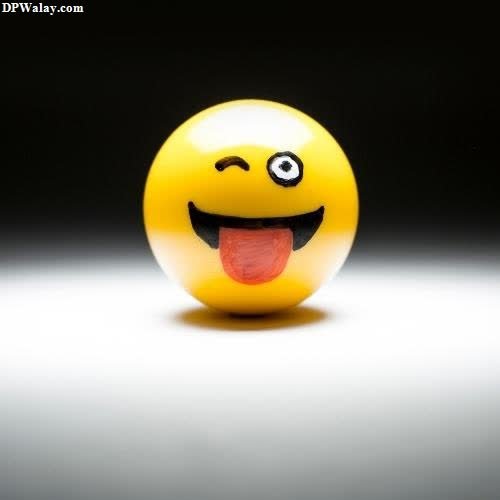 a yellow ball with a smiley face on it best dp whatsapp 
