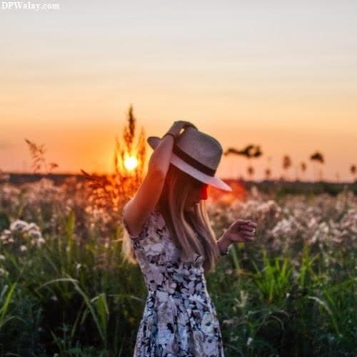 wallpaper for whatsapp dp - a woman in a field at sunset