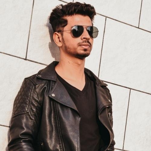 a man in a black leather jacket and sunglasses best whatsapp dp for boys 