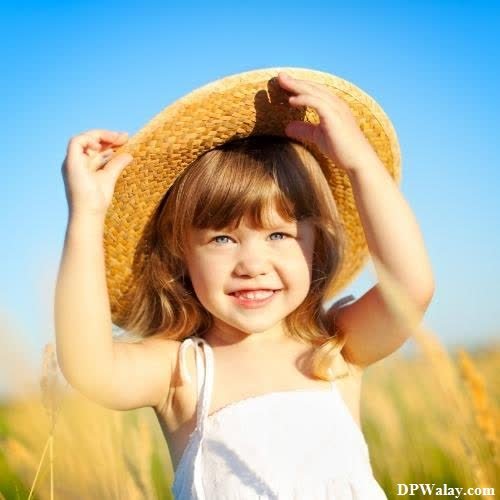 a little girl in a field of wheat images by DPwalay