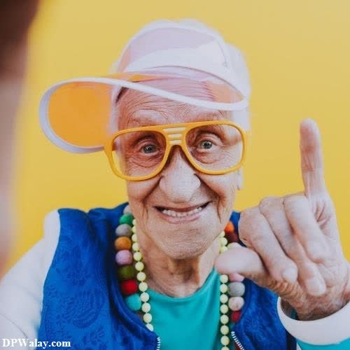 funny whatsapp dp - an elderly woman wearing sunglasses and a hat