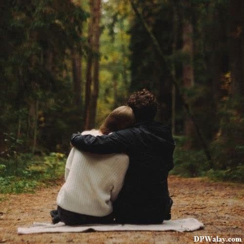 a couple sitting on a blanket in the woods couple dp whatsapp 