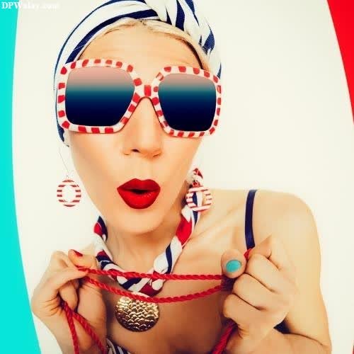 a woman wearing sunglasses and a red and white striped headband crazy whatsapp dp 