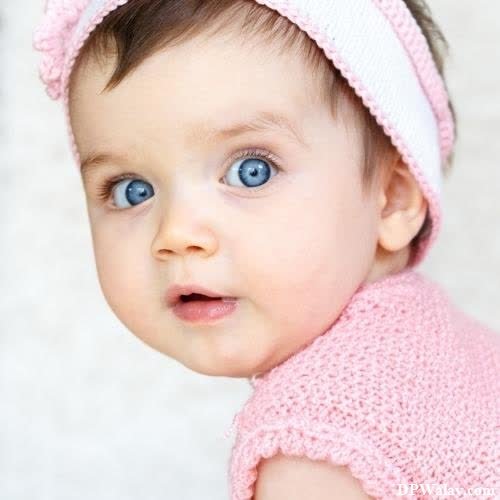 a baby girl wearing a pink hat and pink dress cute baby girl dp 
