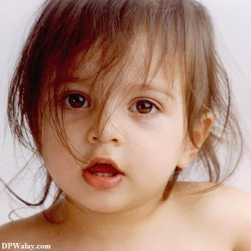 a young girl with a very big blue eyes cute baby girl images for dp