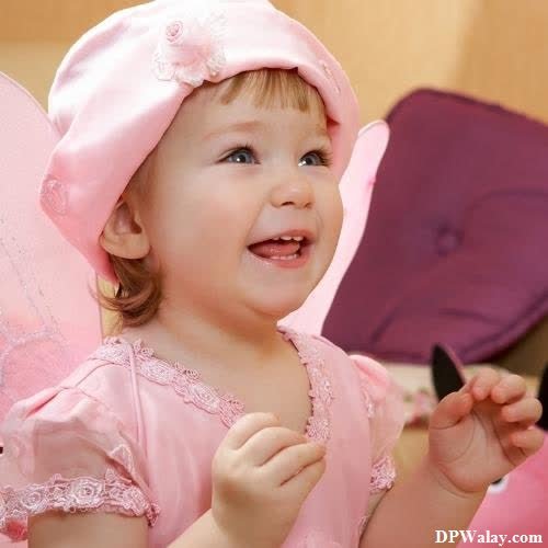 a little girl in a pink dress and hat cute baby girl pic for dp 