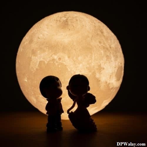 a couple kissing under the moon cute couple dp for whatsapp 
