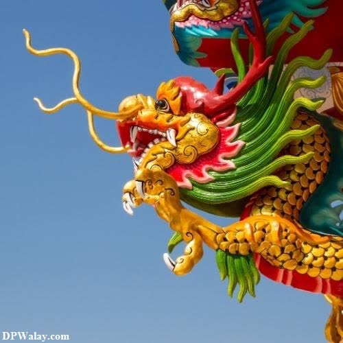a dragon statue on top of a building cute pics for whatsapp dp