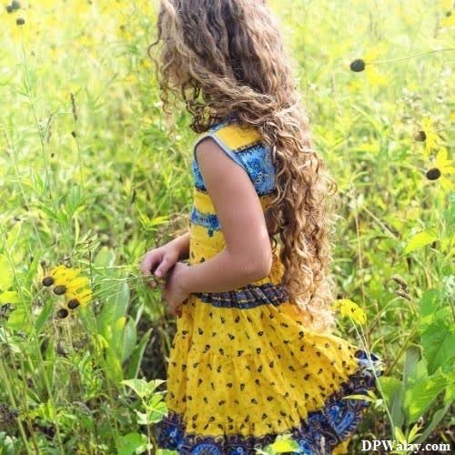 whatsapp dp cute baby girl - a little girl in a field of flowers