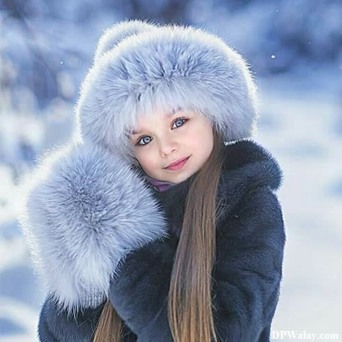 a girl in a fur coat and hat 