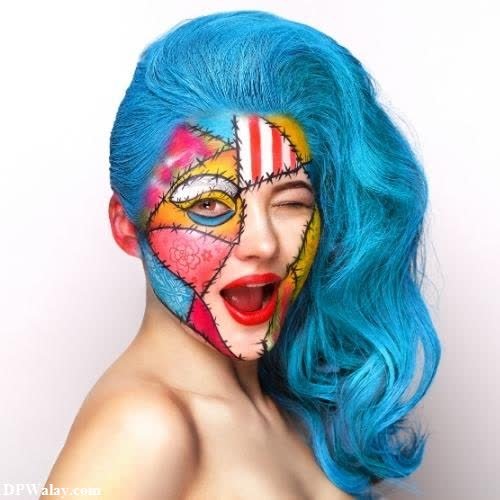 a woman with blue hair and a face painted in the colors of the flag dp pic whatsapp 