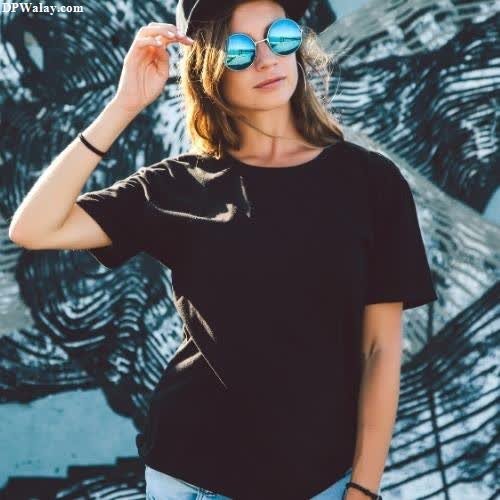 a woman wearing a hat and sunglasses dp pic whatsapp