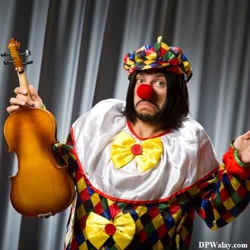 a man dressed as a clown holding a cello
