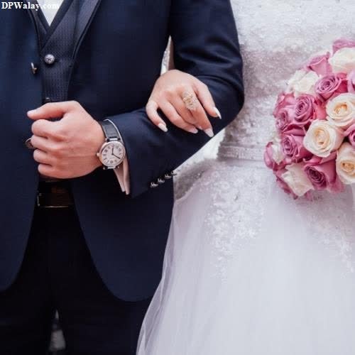 a man and woman in wedding clothes holding hands love couple whatsapp dp 