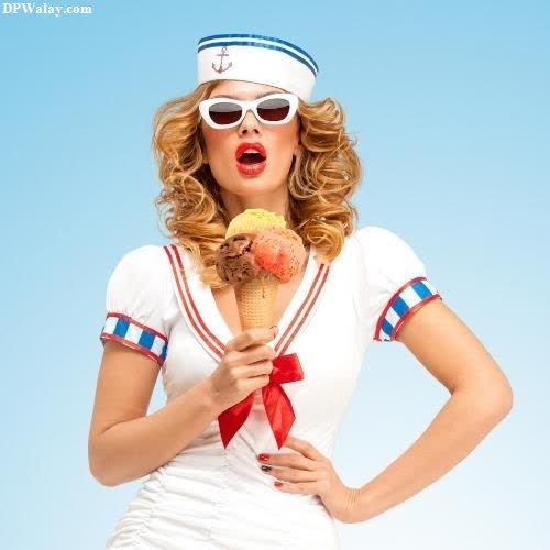 a woman in a sailor costume holding an ice cream cone