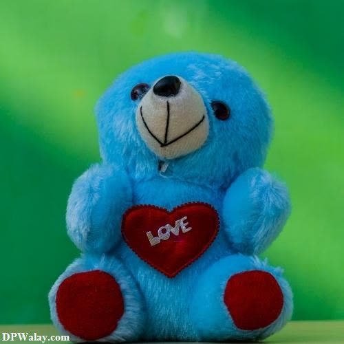 cute whatsapp dp - a teddy bear with a heart on its chest