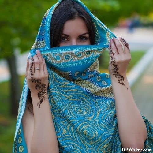 a woman in a blue scarf and head scarf stylish girl dp download 
