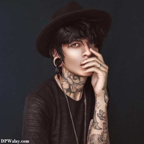 stylish whatsapp dp for girl - a man with tattoos on his neck and neck