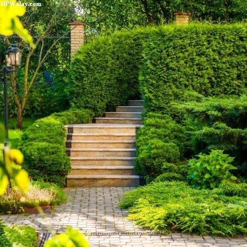 a garden with a stone path and a stone walkway wallpaper for dp whatsapp 
