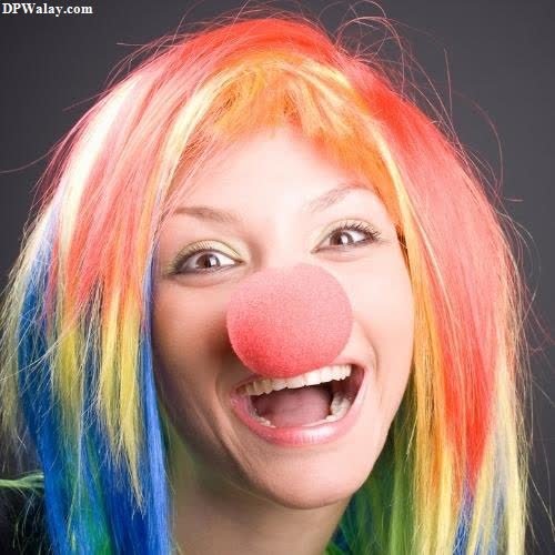 a woman with a clown nose and colorful hair whatsapp dp funny