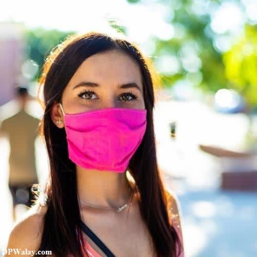 a woman wearing a pink mask attitude hidden face dp
