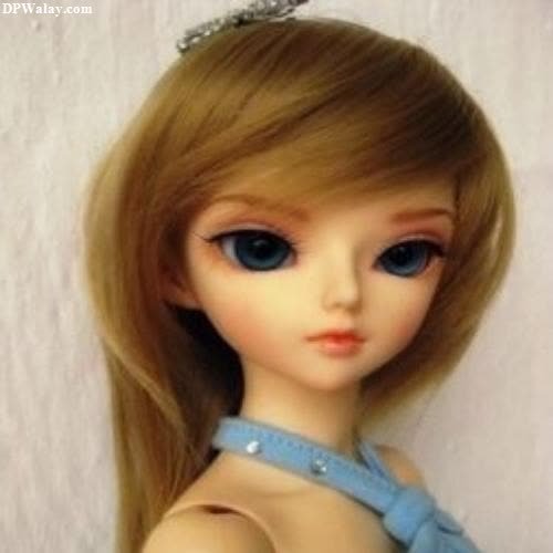 a doll with long blonde hair and blue eyes-lHrp