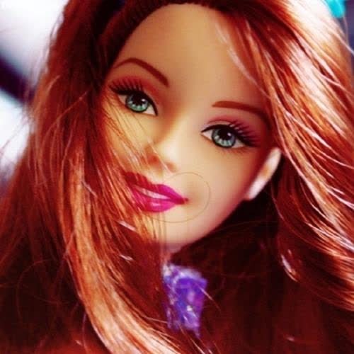 a doll with long red hair and green eyes images by DPwalay