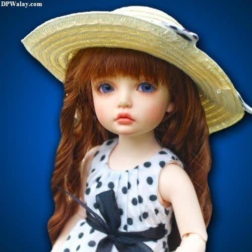 a doll wearing a hat and dress barbie photos dp