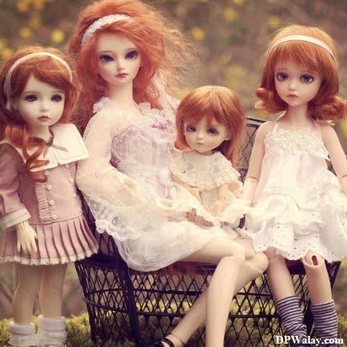 three dolls sitting on a basket in the grass barbie pics for dp