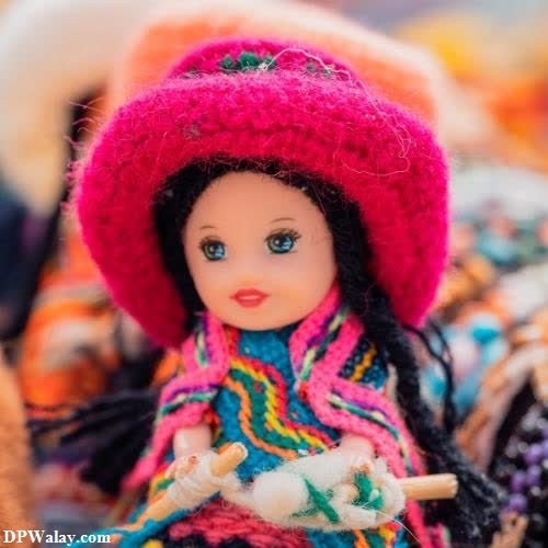 a doll with a hat and a cat barbie pics for dp 