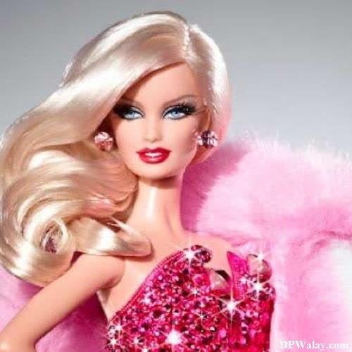 a barbie doll with pink feathers and a pink dress