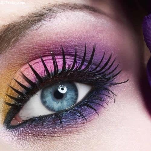 a woman with purple and yellow makeup best unique dp for whatsapp