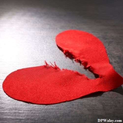 breakup dp - a broken heart on a table