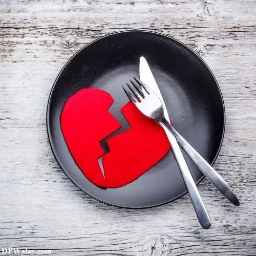 a plate with a broken heart on it