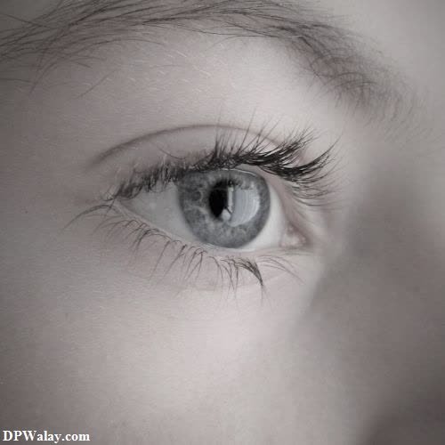 a young girl's eyes with long eyelashes images by DPwalay