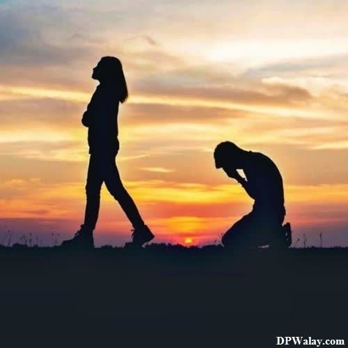 a man and woman are silhouetted against a sunset broken heart sad dp 