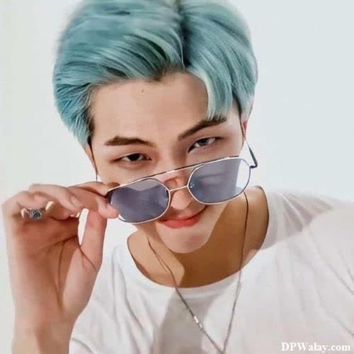 bts whatsapp dp - a man with blue hair and sunglasses
