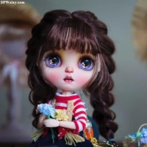a doll with long hair and blue eyes images by DPwalay