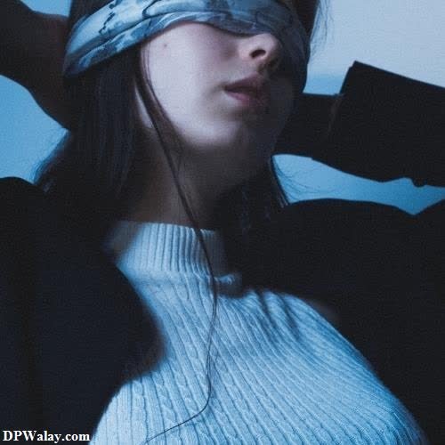 a woman with a blind on her head dp girl image