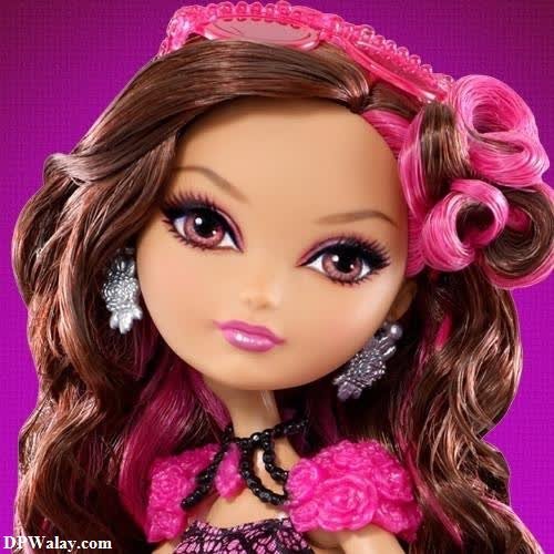 a doll with long brown hair and pink dress