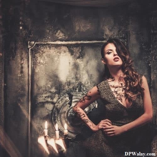 dp pic - a woman in a black dress standing in front of a mirror