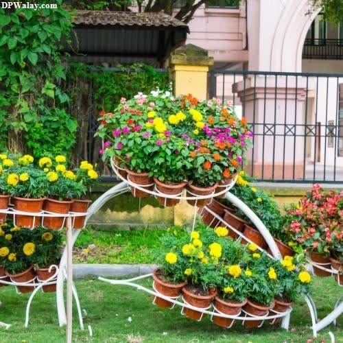 a bicycle made out of pots and flowers 