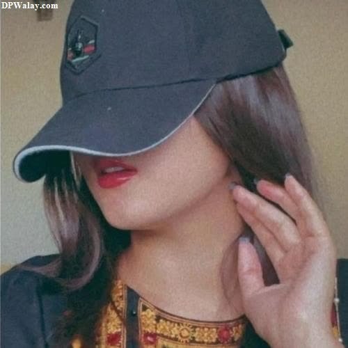 a woman wearing a hat and a necklace girls dp picture 