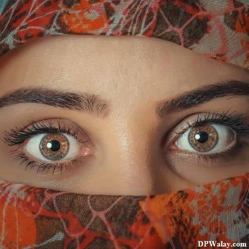 a woman with blue eyes and a red scarf eye girls dp