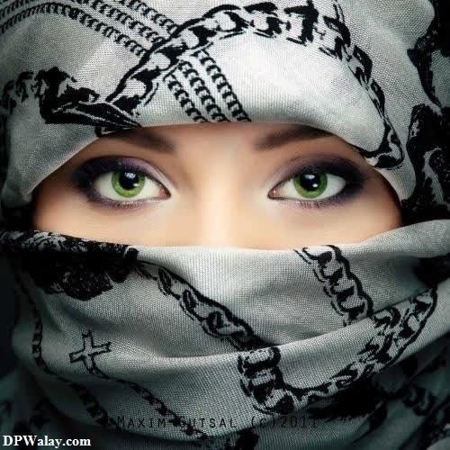 a woman wearing a scarf with a skull on it girls eyes dp 