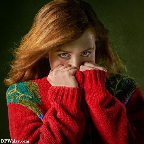a woman with red hair and blue eyes girls face hide dp