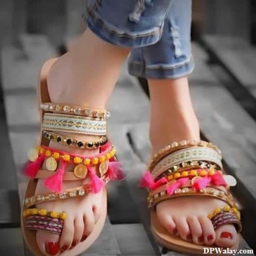 a woman wearing sandals and sandals with colorful beads girls for dp 