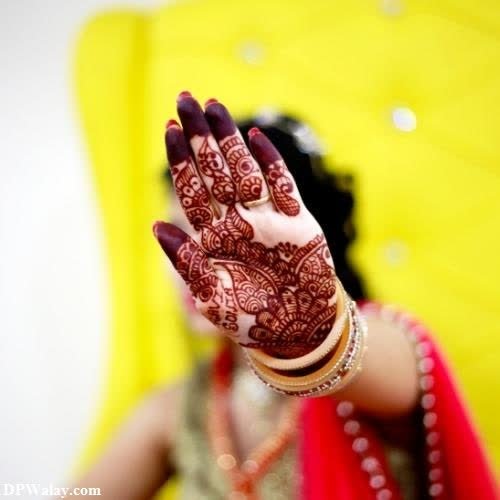 girls dp - a woman with hennap on her hands-dTCj