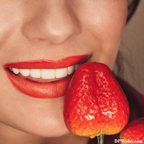 a woman with a red lipstick and a red pepper